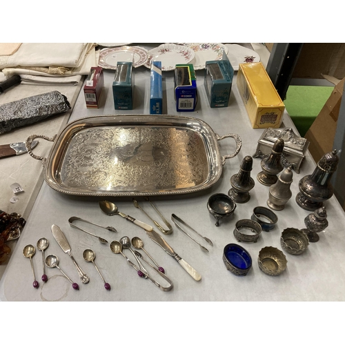 259 - A QUANTITY OF SILVER PLATED ITEMS TO INCLUDE A HANDLED TRAY, CRUET SET, SUGAR SHAKER, EMBOSSED TRINK... 