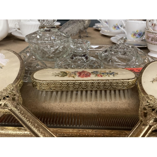 286 - A GLASS DRESSING TABLE SET TO INCLUDE A TRAY AND TRINKET BOWL PLUS A PETIT-POINT HAND MIRROR, BRUSHE... 