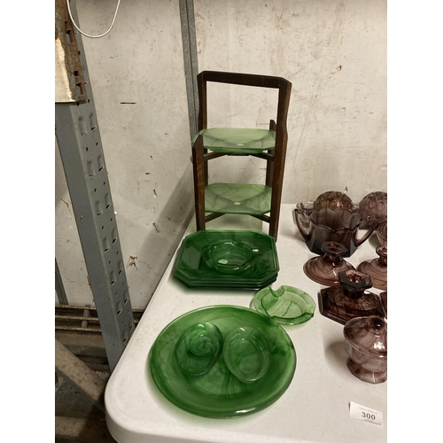 300 - A QUANTITY OF GREEN CLOUD GLASS TO INCLUDE A RETRO STYLE CAKE STAND, PLATES, SMALL BOWLS, ETC