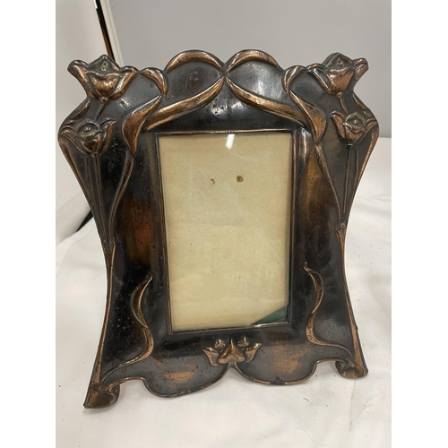 59 - TWO ARTS AND CRAFTS STYLE COPPER PHOTOGRAPH FRAMES