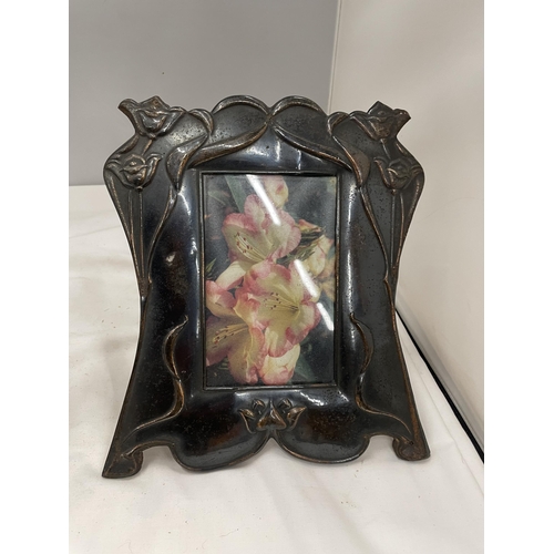 59 - TWO ARTS AND CRAFTS STYLE COPPER PHOTOGRAPH FRAMES