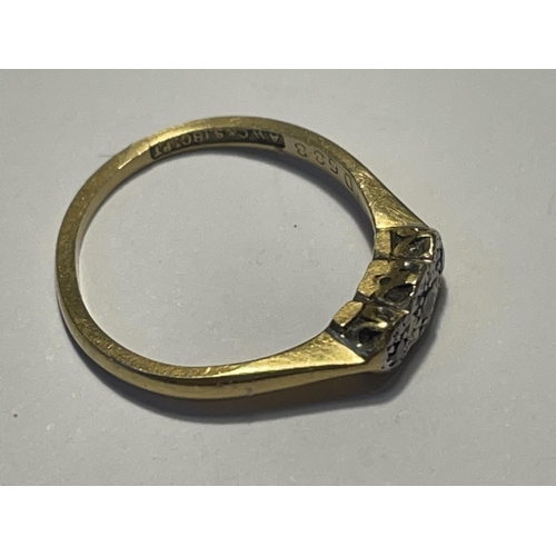 569 - AN 18 CARAT GOLD RING WITH THREE IN LINE DIAMONDS SIZE J GROSS WEIGHT 1.96 GRAMS