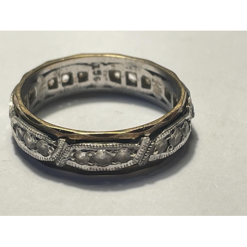 572 - A 9 CARAT GOLD ETERNITY RING WITH CLEAR STONES SIZE L/M GROSS WEIGHT 2.96 GRAMS