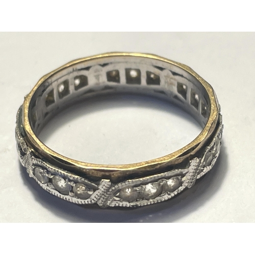 572 - A 9 CARAT GOLD ETERNITY RING WITH CLEAR STONES SIZE L/M GROSS WEIGHT 2.96 GRAMS