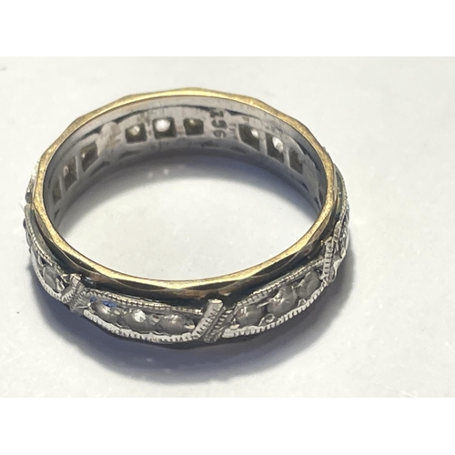 572 - A 9 CARAT GOLD ETERNITY RING WITH CLEAR STONES SIZE L/M GROSS WEIGHT 2.96 GRAMS