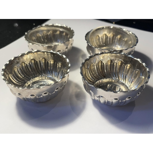 575 - FOUR HALLMARKED SHEFFIELD SILVER SALTS TWO WITH GLASS LINERS GROSS WEIGHT WITHOUT LINERS 67.7 GRAMS