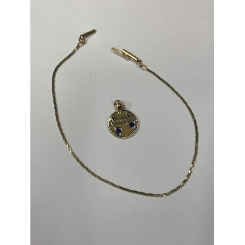 580A - A 14 CARAT GOLD BRACELET WITH 10 CARAT GOLD CHARM