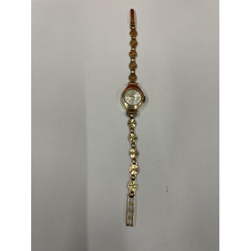 588 - A PRECIMAX 17 JEWEL INCABLOC LADIES 9 CARAT GOLD WATCH AND STRAP APPROXIMATE WEIGHT 8.5 GRAMS