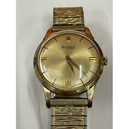 589 - A ACCURIST 9 CARAT GOLD GENTS WRISTWRIST WITH A GOLD PLATED STRAP