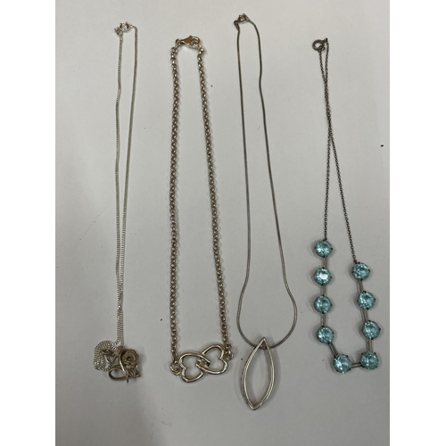 617 - FOUR SILVER NECKLACES WITH PENDANTS