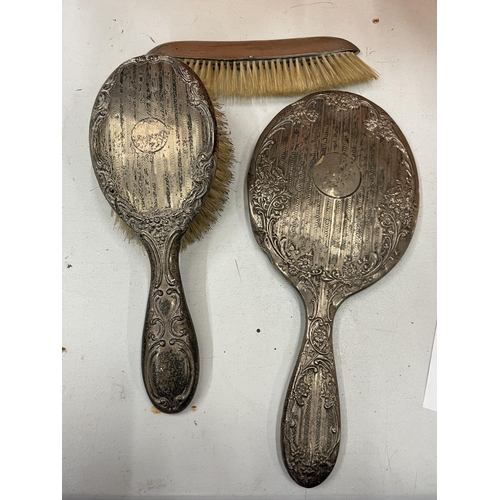 744 - THREE HALLMARKED CHESTER SILVER ITEMS TO INCLUDE A HAIRBRUSH, HAND MIRROR AND COMB