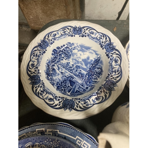 1008 - A QUANTITY OF BLUE AND WHITE POTTERY TO INCLUDE BOWLS, PLATES, ETC PLUS A TEAPOT - NO LID