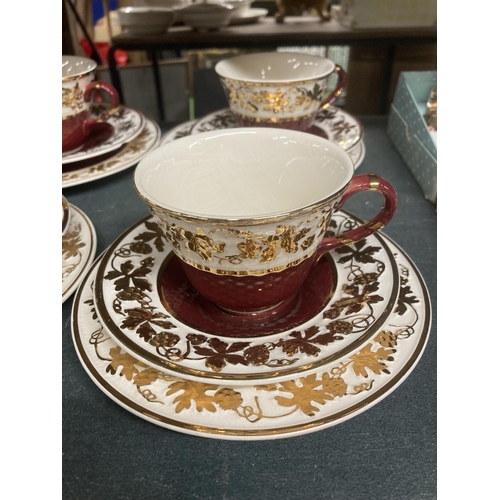 1016 - A QUANTITY OF VINTAGE WADE 'RUBYTONE' CUPS, SAUCERS AND SIDE PLATES