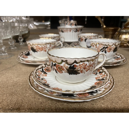 1028 - AN ANTIQUE TEASET CIRCA LATE 18TH EARLY 19TH CENTURY TO INCLUDE FIVE TRIOS, CAKE PLATE, MILK AND SUG... 