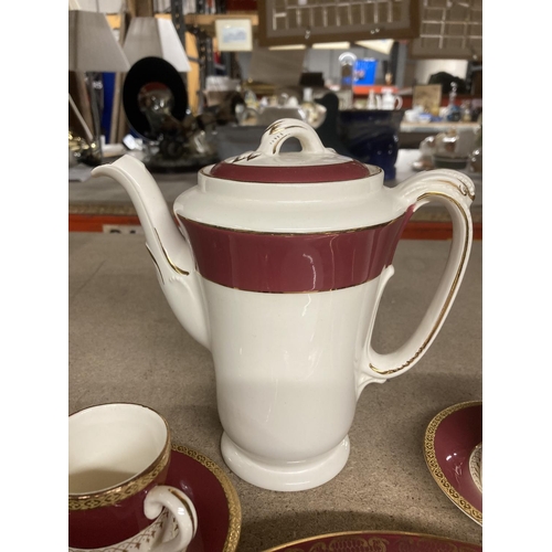 1039 - A VINTAGE BURLEIGHWARE COFFEE SET IN CRIMSON AND WHITE WITH GILD DECORATION TO INCLUDE A COFFEE POT,... 