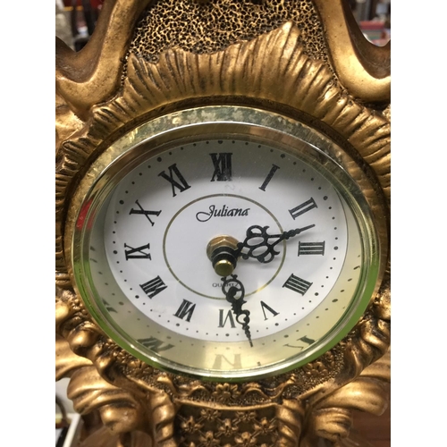 1079 - A LARGE GILT COLOURED JULIANA MANTLE CLOCK WITH ELABORATE DECORATION HEIGHT 46CM