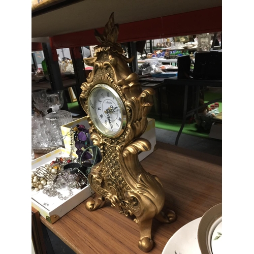 1079 - A LARGE GILT COLOURED JULIANA MANTLE CLOCK WITH ELABORATE DECORATION HEIGHT 46CM