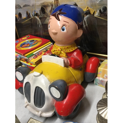 1096A - A HARD PLASTIC NODDY IN HIS CAR MODEL CHARITY MONEY BOX MISSING HIS HAT AND THE BASE - 32 CM WIDE X ... 