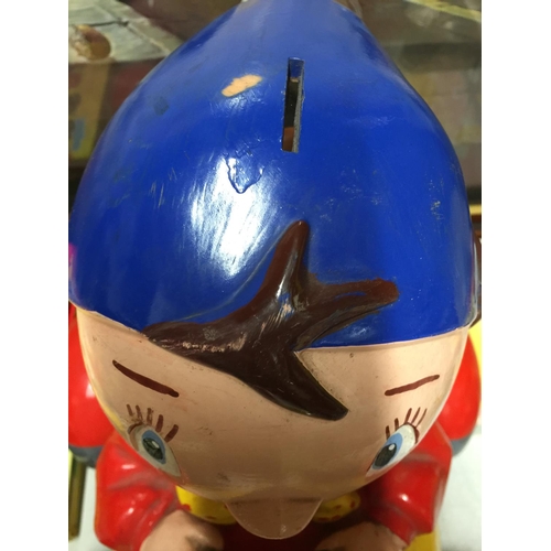 1096A - A HARD PLASTIC NODDY IN HIS CAR MODEL CHARITY MONEY BOX MISSING HIS HAT AND THE BASE - 32 CM WIDE X ... 