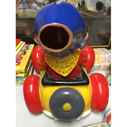 1096A - A HARD PLASTIC NODDY IN HIS CAR MODEL CHARITY MONEY BOX MISSING HIS HAT AND THE BASE - 32 CM WIDE X ... 