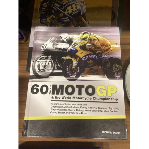 1115 - A QUANTITY OF MOTORCYCLING BOOKS TOINCLUDE FIM 1904-2004, MOTO GP, VALENTINO ROSSI, ETC