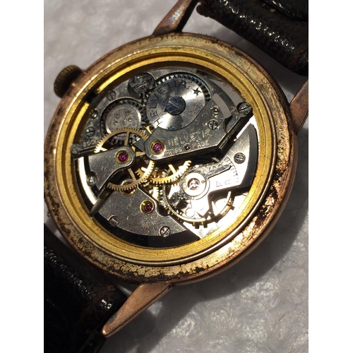 732 - A 9CT GOLD VINTAGE HELVETIA WRISTWATCH