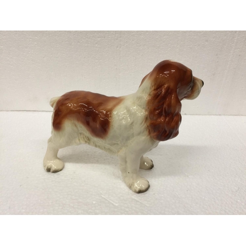 769 - A LARGE COOPERCRAFT SPANIEL TOGETHER WITH A CERAMIC LABRADOR