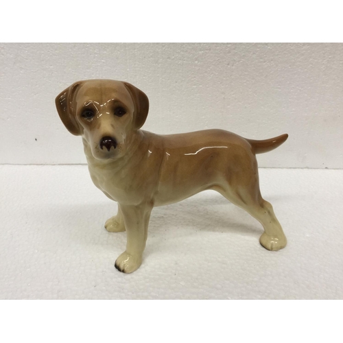 769 - A LARGE COOPERCRAFT SPANIEL TOGETHER WITH A CERAMIC LABRADOR