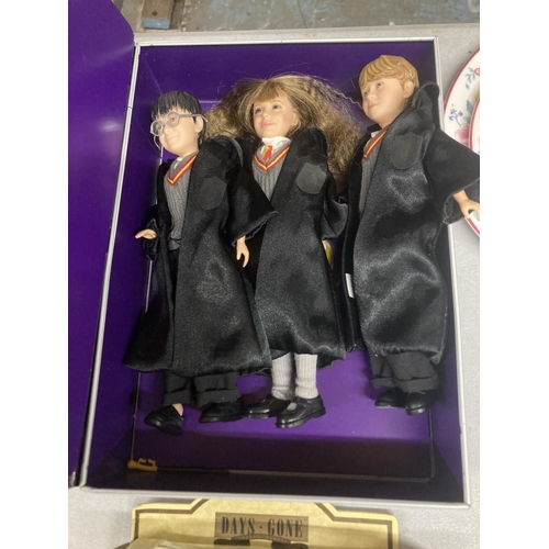 976 - THREE BOXED HARRY POTTER DOLLS - HARRY POTTER, HERMIONE AND RON WEASLEY PLUS TWO DIECAST CARS