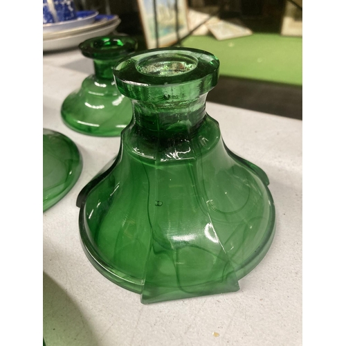 977 - A QUANTITY OF GREEN CLOUD GLASS TO INCLUDE A TRAY, CANDLESTICKS AND DRESSING TABLE LIDDED POTS