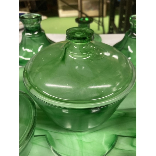 977 - A QUANTITY OF GREEN CLOUD GLASS TO INCLUDE A TRAY, CANDLESTICKS AND DRESSING TABLE LIDDED POTS