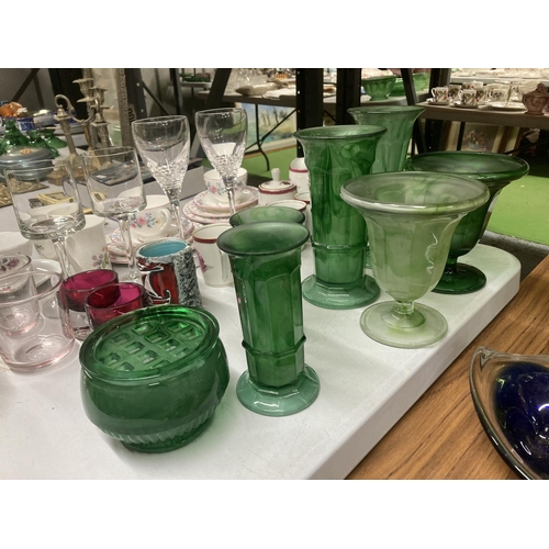 979 - A QUANTITY OF GREEN CLOUD GLASSWARE TO INCLUDE MAINLY VASES OF VARYING SIZES