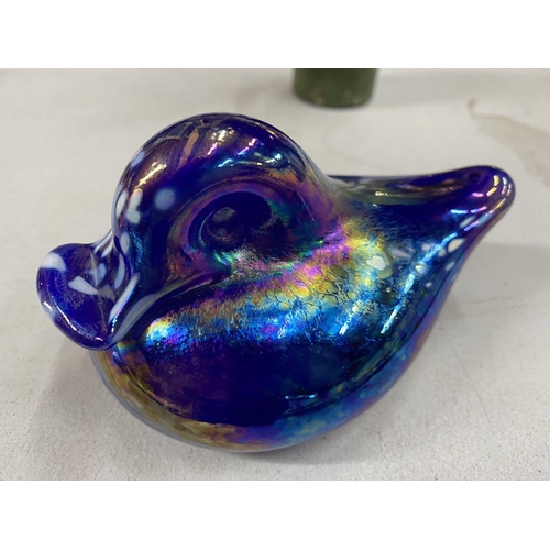 268A - AN IRIDESCENT GLASS PAPER WEIGHT IN THE FORM OF A BIRD