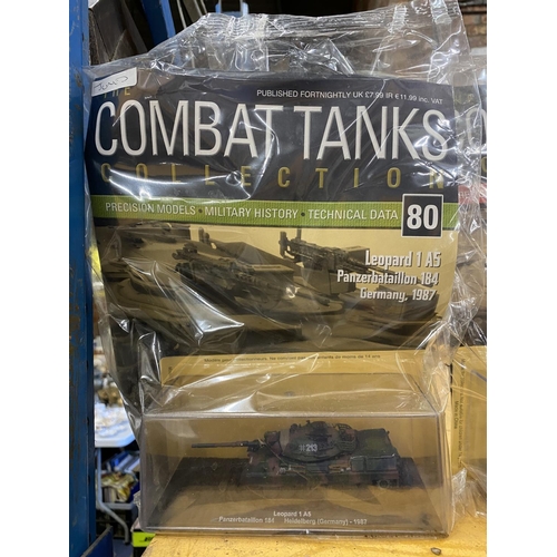 503 - SEVEN COMBAT TANKS IN SEALED PODS, SIX STILL BEING WITH THE ORIGINAL MAGAZINES