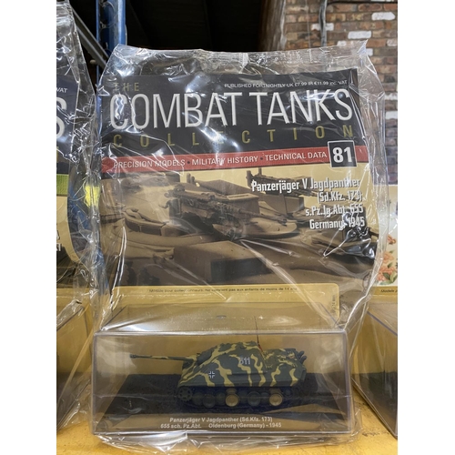 503 - SEVEN COMBAT TANKS IN SEALED PODS, SIX STILL BEING WITH THE ORIGINAL MAGAZINES