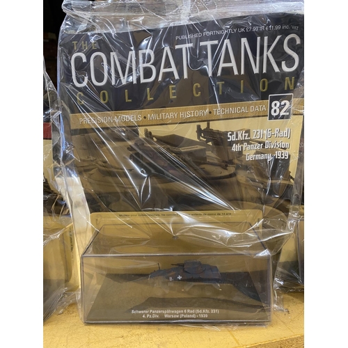 503 - SEVEN COMBAT TANKS IN SEALED PODS, SIX STILL BEING WITH THE ORIGINAL MAGAZINES