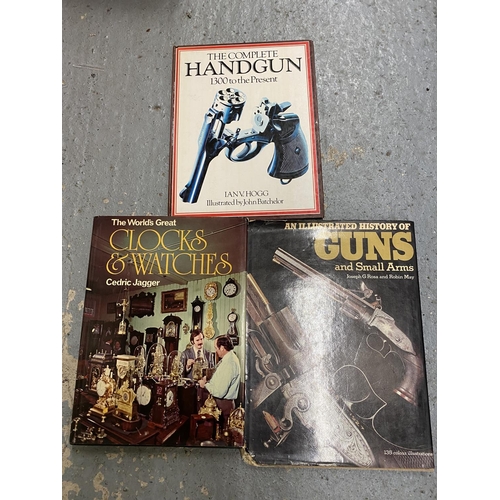 507 - THREE BOOKS TO INCLUDE THE COMPLETE HANDGUN, HISTORY OF GUNS AND CLOCKS AND WATCHES