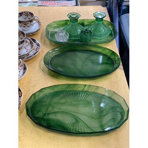 551 - A QUANTITY OF GREEN CLOUD GLASSWARE TO INCLUDE TRAYS, CANDLESTICKS, ETC