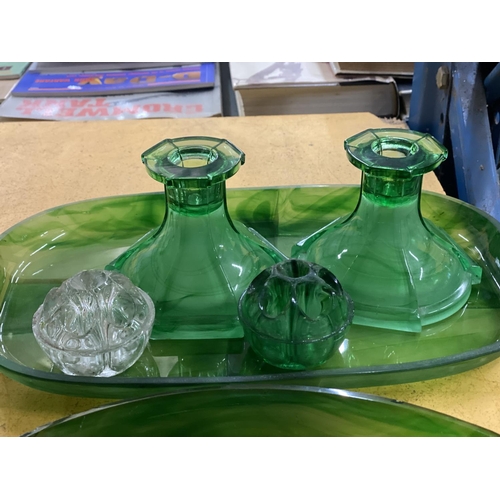 551 - A QUANTITY OF GREEN CLOUD GLASSWARE TO INCLUDE TRAYS, CANDLESTICKS, ETC