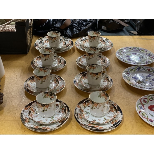 555 - A COLLECTION OF DELPHINE CHINA CUPS, SAUCERS AND PLATES