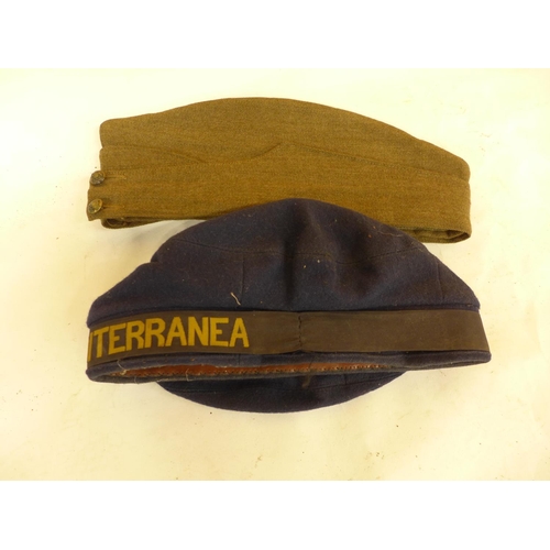 467 - A WORLD WAR II INFANTRY FORAGE CAP DATED 1940 AND A CIA TRASMEDITERRANEA NAVAL CAP (2)