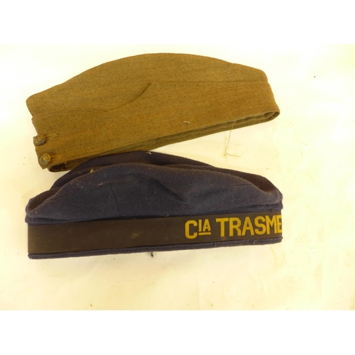 467 - A WORLD WAR II INFANTRY FORAGE CAP DATED 1940 AND A CIA TRASMEDITERRANEA NAVAL CAP (2)