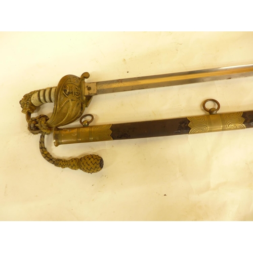 496 - A QUEEN VICTORIA NAVAL OFFICERS SWORD AND SCABBARD, 80CM BLADE, BRASS GUARD WITH SWORD KNOT