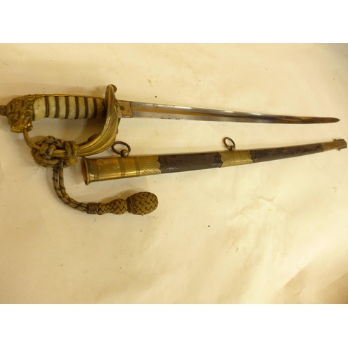 496 - A QUEEN VICTORIA NAVAL OFFICERS SWORD AND SCABBARD, 80CM BLADE, BRASS GUARD WITH SWORD KNOT