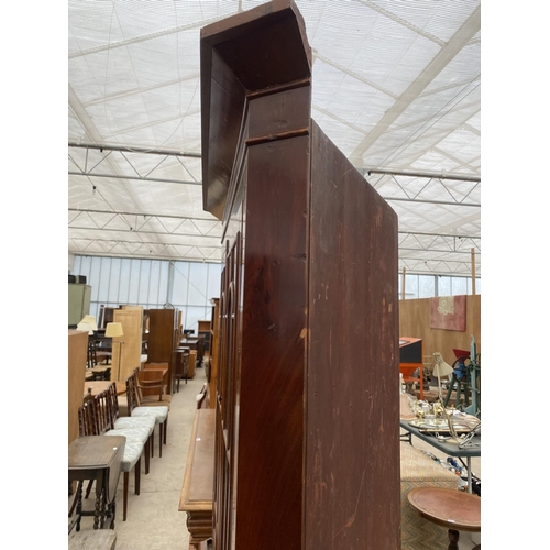 2490 - A MAHOGANY FULL LENGTH CORNER CUPBOARD WITH GLAZED UPPER PORTION AND CUPBOARDS TO THE BASE, 41