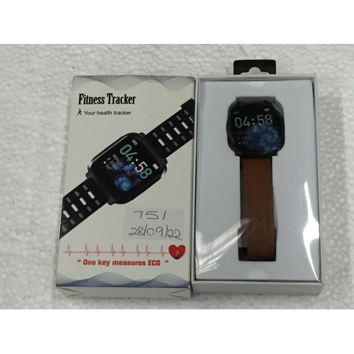 751 - A SMART WATCH FITNESS TRACKER IN A BOX SEEN WORKING BUT NO WARRANTY