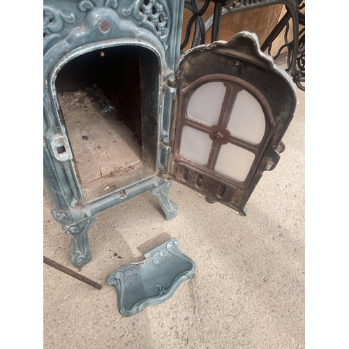 1208 - A VINTAGE DEVILLE AND CO ENAMELED CAST IRON LOG BURNING STOVE (FRONT PLATE REQUIRES ATTENTION - SEE ... 