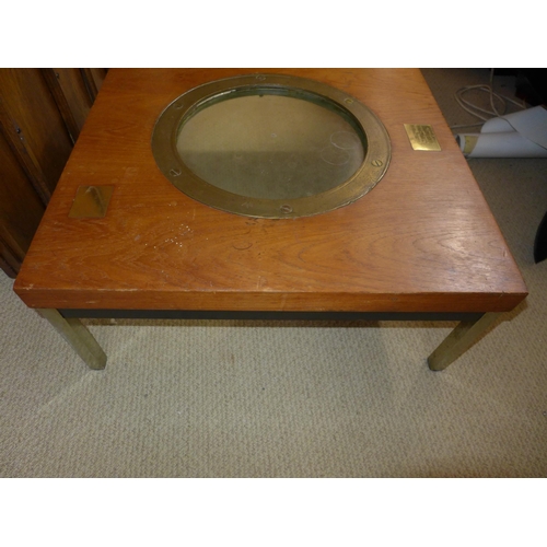 488 - A HISTORIC COFFEE TABLE WITH INSET PORTHOLE RIM FROM SS CATILIAN SUNK AT SCAPA FLOW, THE GLASS IS FR... 