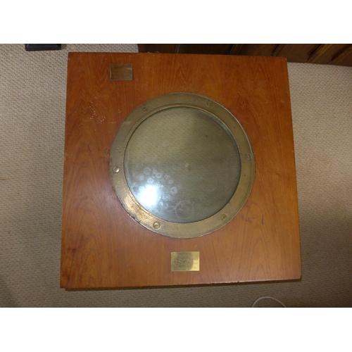 488 - A HISTORIC COFFEE TABLE WITH INSET PORTHOLE RIM FROM SS CATILIAN SUNK AT SCAPA FLOW, THE GLASS IS FR... 