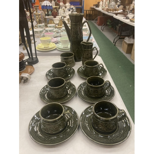 86 - AN ELLGREAVE POTTERY SAXONY DARK GREEN COFFEE SET TO INCLUDE A COFFEE POT, CREAM JUG, SUGAR BOWL, CU... 